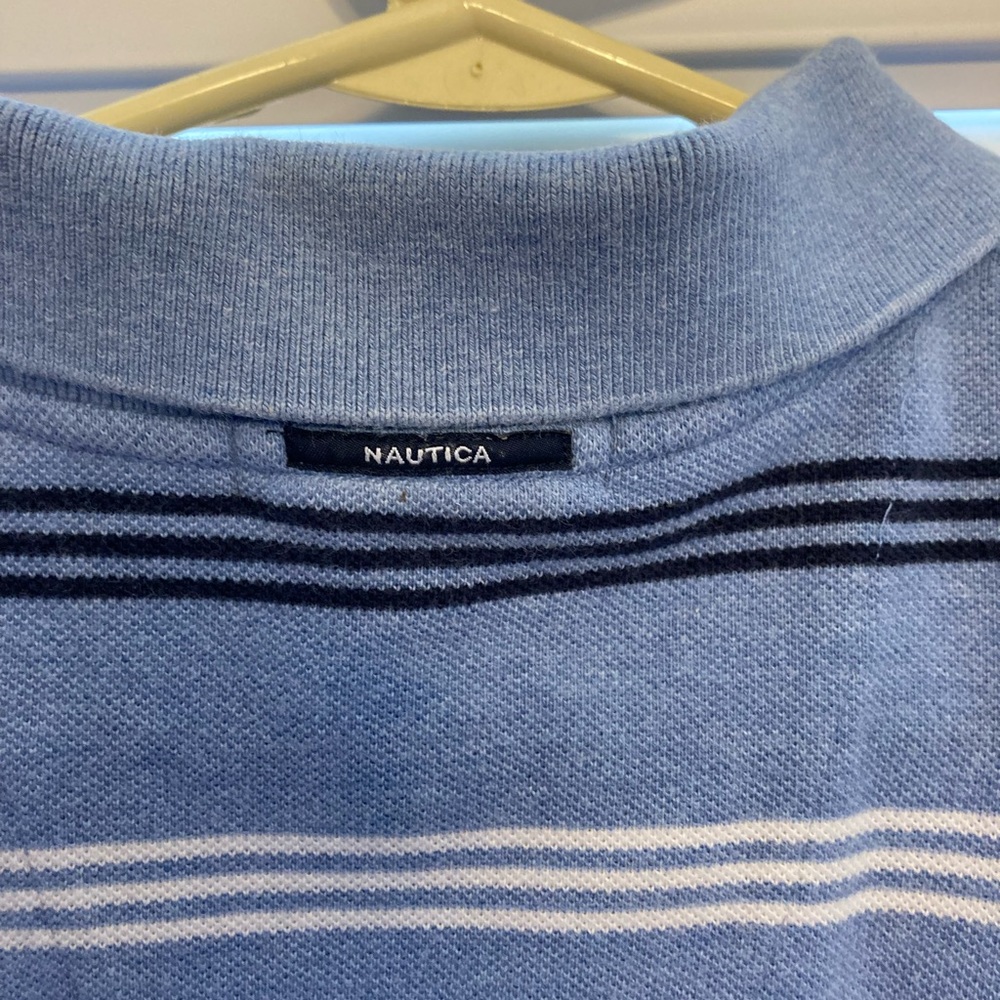 Nautica men’s size medium striped Polo shirt. Great for a blue-eyed man.
